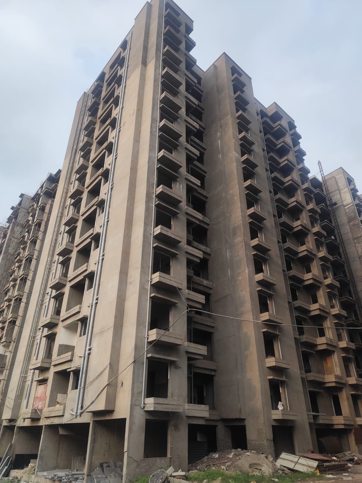 TANZANITE TOWER 2, Outside plaster 100% completed. Putty and Flooring work done from 2nd to 11th Floor and 1st Floor in progress. Conduite laying completed as on May2026